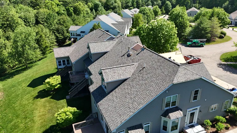 Aerial blue gray colonial new roof