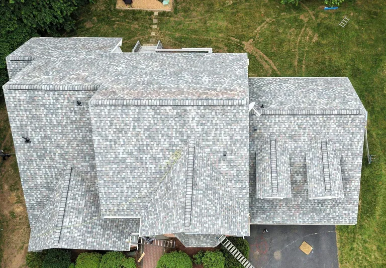 Aerial overhead new shingle roof full house