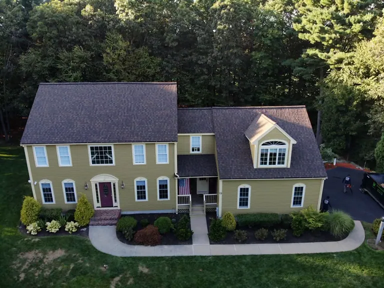 Sage green colonial new roof aerial